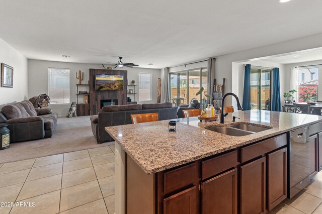 26032 W Quail Ave, Buckeye, AZ 85396 - kitchen with a sink, stainless steel dishwasher, light tile patterned floors, open floor plan, and recessed lighting