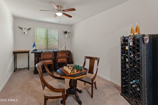 26032 W Quail Ave, Buckeye, AZ 85396 - dining room with carpet flooring, ceiling fan, and baseboards