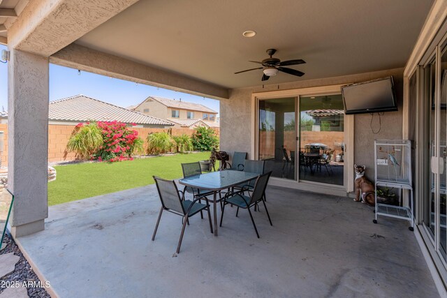 26032 W Quail Ave, Buckeye, AZ 85396 - view of patio with outdoor dining area and a ceiling fan