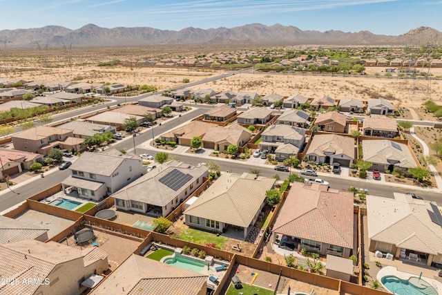 26032 W Quail Ave, Buckeye, AZ 85396 - aerial view of residential area featuring a pool area and a mountainous background