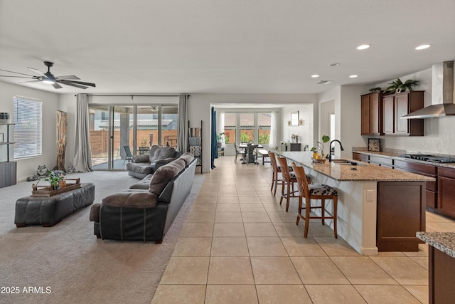 26032 W Quail Ave, Buckeye, AZ 85396 - living room featuring light tile patterned flooring, ceiling fan, and recessed lighting