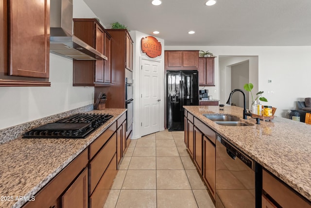 26032 W Quail Ave, Buckeye, AZ 85396 - kitchen with black appliances, wall chimney exhaust hood, a sink, light stone counters, and recessed lighting