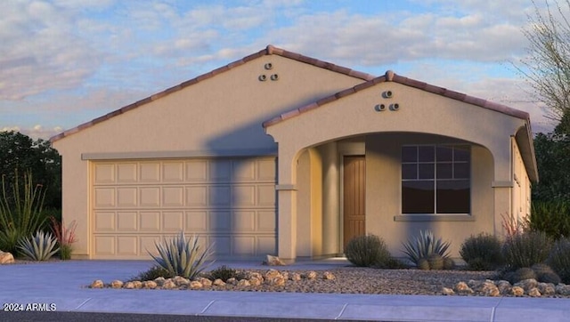 view of front of home with a garage