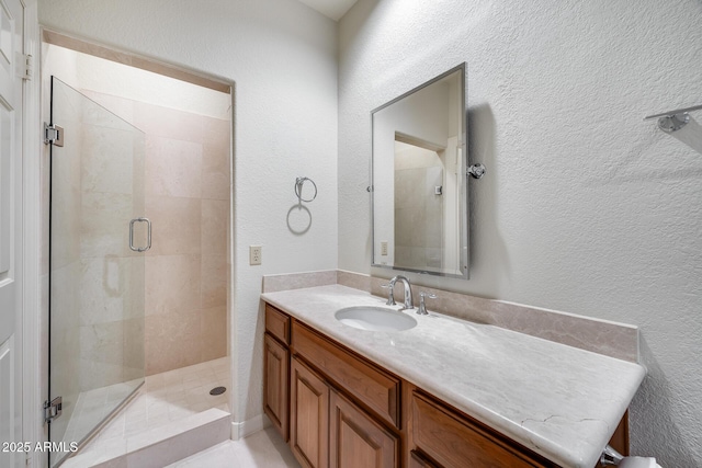 bathroom featuring vanity and walk in shower