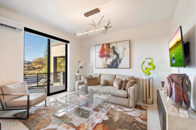 living room with a chandelier, light tile patterned flooring, and a wall unit AC