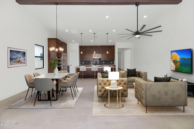 6727 N 9th Dr, Phoenix, AZ 85013 - living room featuring a ceiling fan, recessed lighting, and a chandelier
