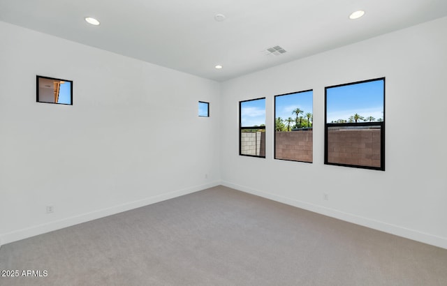 6727 N 9th Dr, Phoenix, AZ 85013 - carpeted spare room featuring recessed lighting and baseboards