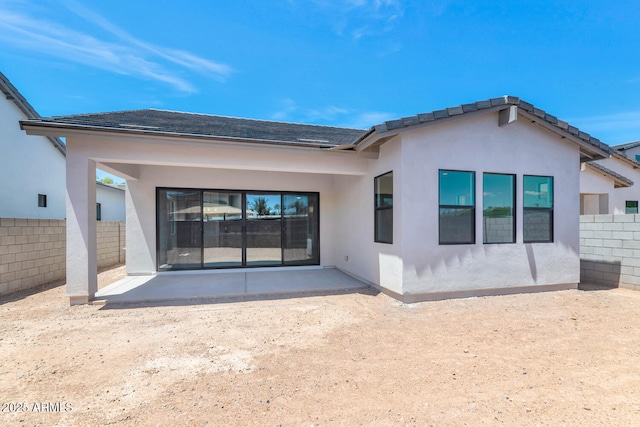 6727 N 9th Dr, Phoenix, AZ 85013 - rear view of property featuring a patio, fence, and stucco siding