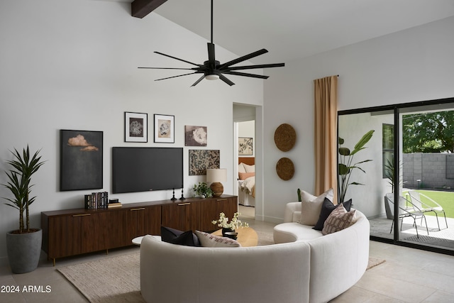 living room with ceiling fan, high vaulted ceiling, and beamed ceiling