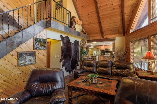 living room with high vaulted ceiling, wooden ceiling, and beamed ceiling