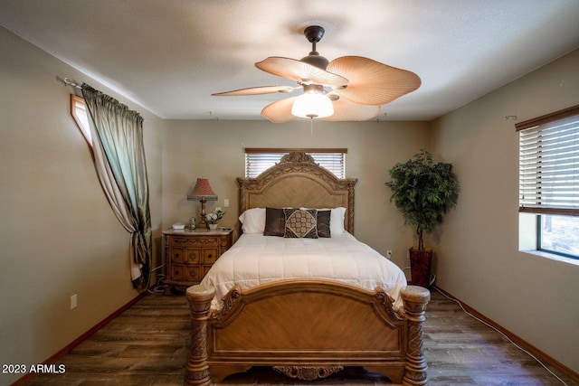 bedroom with ceiling fan and hardwood / wood-style flooring