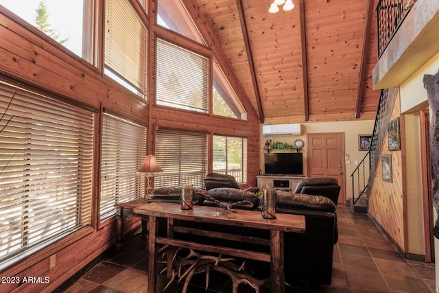 tiled living room with a wall unit AC, wood ceiling, beam ceiling, and high vaulted ceiling