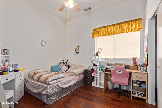 bedroom with wood finished floors and visible vents