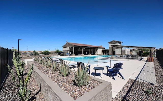 view of pool featuring a patio area