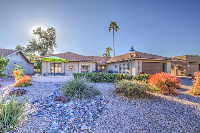 ranch-style house with a garage