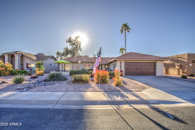 view of front of property with a garage