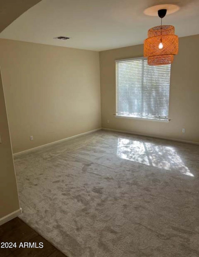 empty room with carpet floors