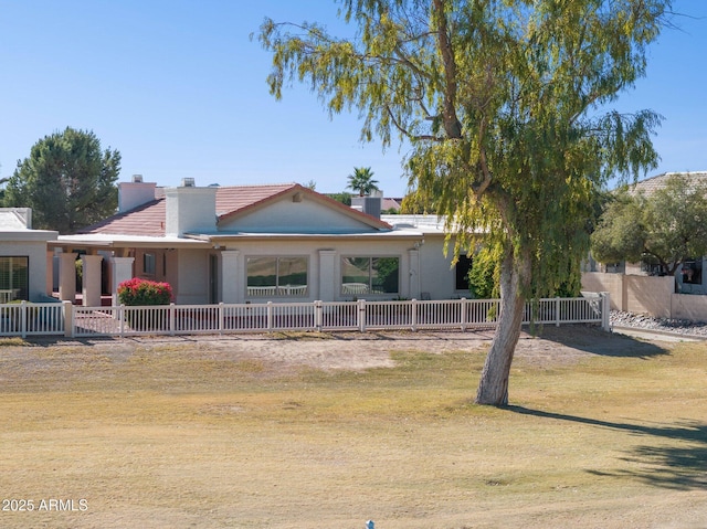 exterior space with a front lawn