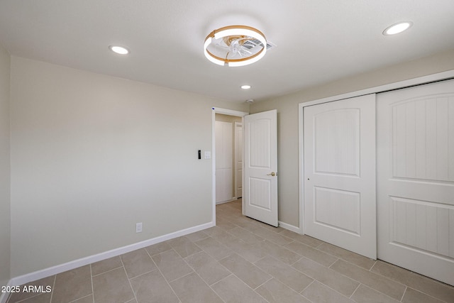 unfurnished bedroom featuring a closet