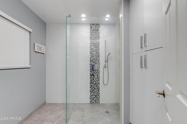 bathroom featuring a shower