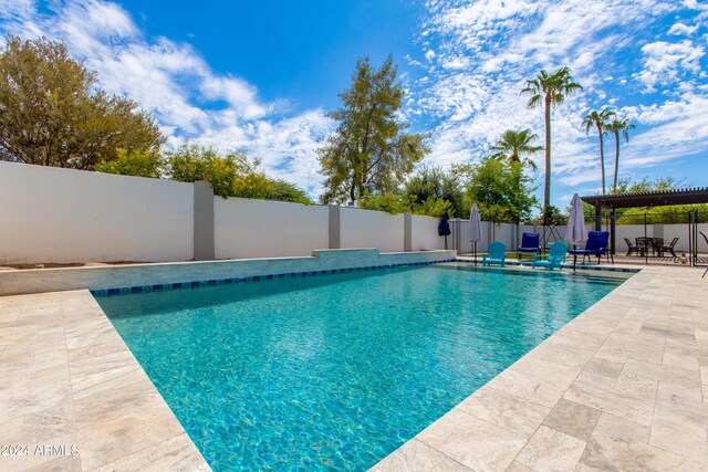 view of pool with a patio area