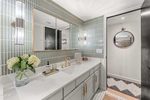 bathroom featuring tile patterned floors and vanity