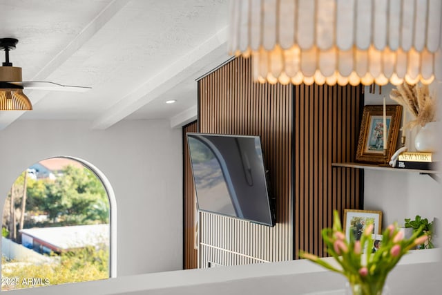 interior space featuring ceiling fan