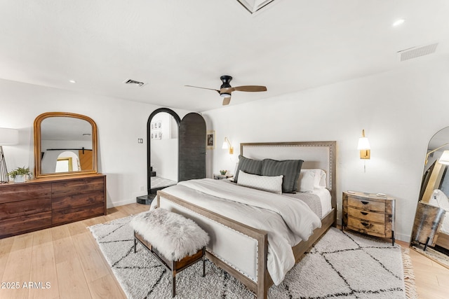 bedroom featuring light wood-type flooring and ceiling fan