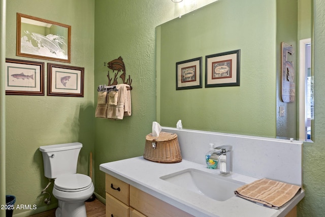 3123 S Indian Paint Ln, Pinetop, AZ 85935 - half bath with toilet, vanity, and wood finished floors