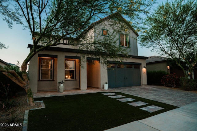 4226 E Coconino Pl, Chandler, AZ 85249 - view of front of home featuring a garage, driveway, and stucco siding