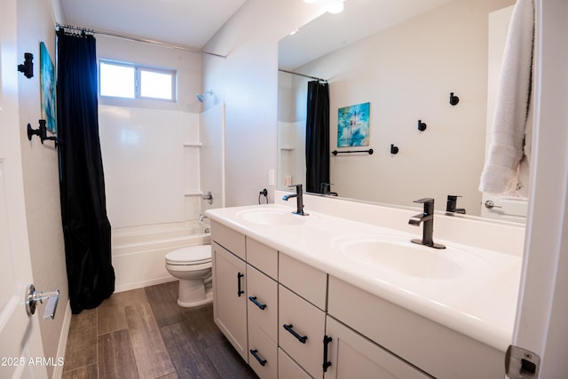 4226 E Coconino Pl, Chandler, AZ 85249 - bathroom featuring double vanity, shower / bath combo with shower curtain, toilet, and wood finished floors