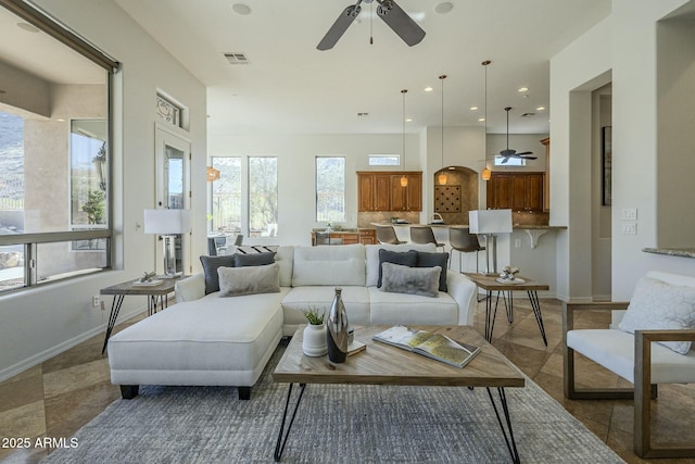 living room with ceiling fan