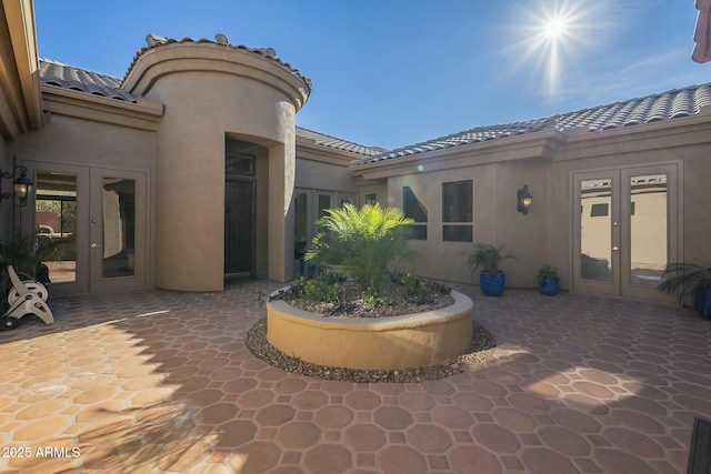 view of patio / terrace featuring french doors