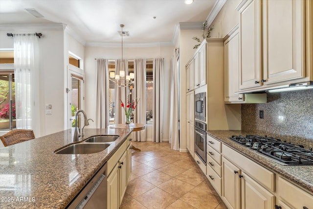 kitchen featuring a sink, crown molding, cream cabinetry, and stainless steel appliances