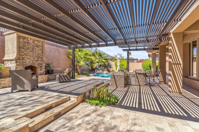 view of patio with an outdoor pool, a pergola, an outdoor stone fireplace, and a fenced backyard