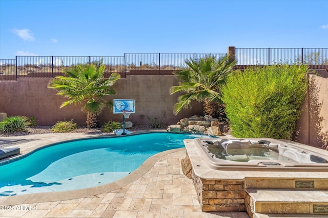 view of pool featuring a fenced in pool, a patio, a fenced backyard, and a hot tub