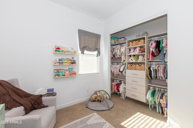 game room featuring light colored carpet