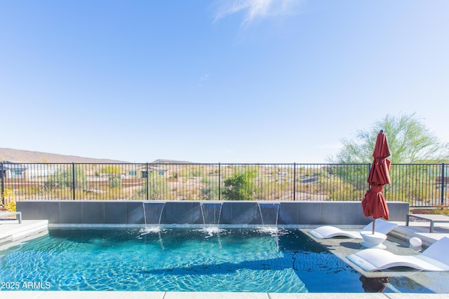 view of pool featuring pool water feature