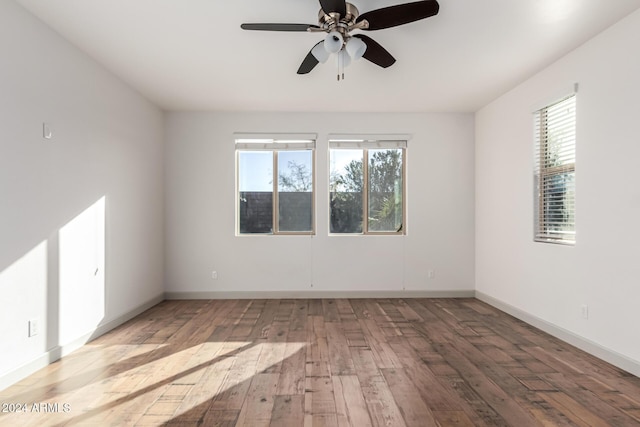 unfurnished room featuring wood-type flooring and ceiling fan