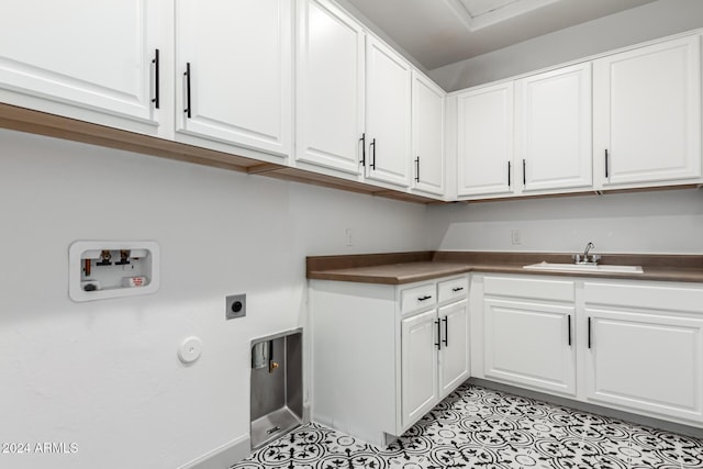 laundry area featuring sink, cabinets, washer hookup, electric dryer hookup, and light tile patterned flooring