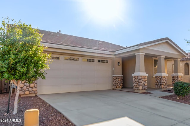 view of front of home with a garage