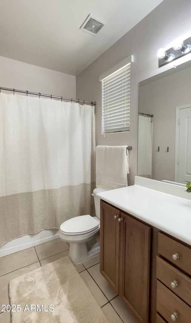 18575 W Vogel Ave, Goodyear, AZ 85338 - full bath with vanity, tile patterned flooring, and toilet