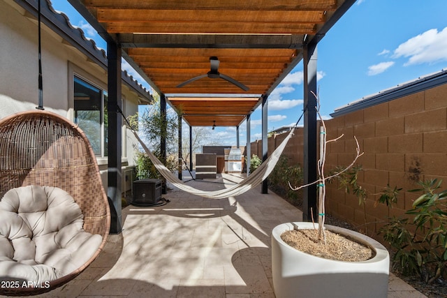 view of patio / terrace featuring a fenced backyard, central AC, and a ceiling fan