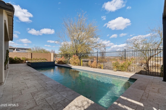 view of pool featuring a fenced in pool, a fenced backyard, and a patio