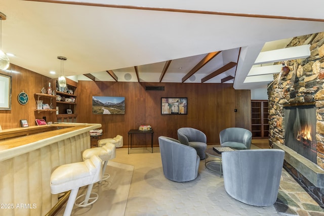 345 W Gardenia Dr, Phoenix, AZ 85021 - interior space featuring bar area, beamed ceiling, wooden walls, visible vents, and a fireplace