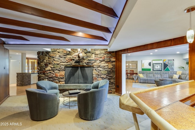 345 W Gardenia Dr, Phoenix, AZ 85021 - living room featuring a stone fireplace and beam ceiling