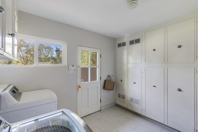 345 W Gardenia Dr, Phoenix, AZ 85021 - laundry area featuring cabinet space and visible vents