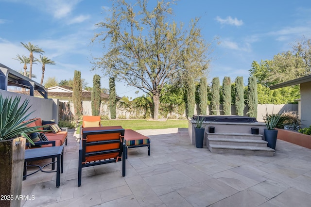 345 W Gardenia Dr, Phoenix, AZ 85021 - view of patio with a fenced backyard, an outdoor living space, and a hot tub
