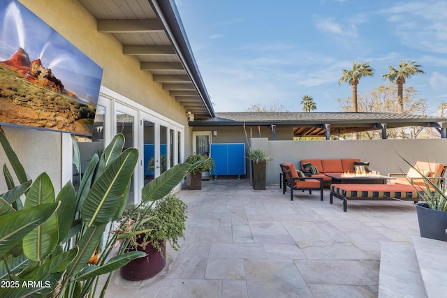 345 W Gardenia Dr, Phoenix, AZ 85021 - view of patio with an outdoor living space with a fire pit