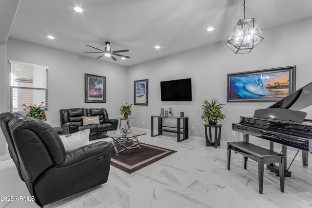 22837 E Silver Creek Ln, Queen Creek, AZ 85142 - living room with marble finish floor, baseboards, ceiling fan with notable chandelier, and recessed lighting